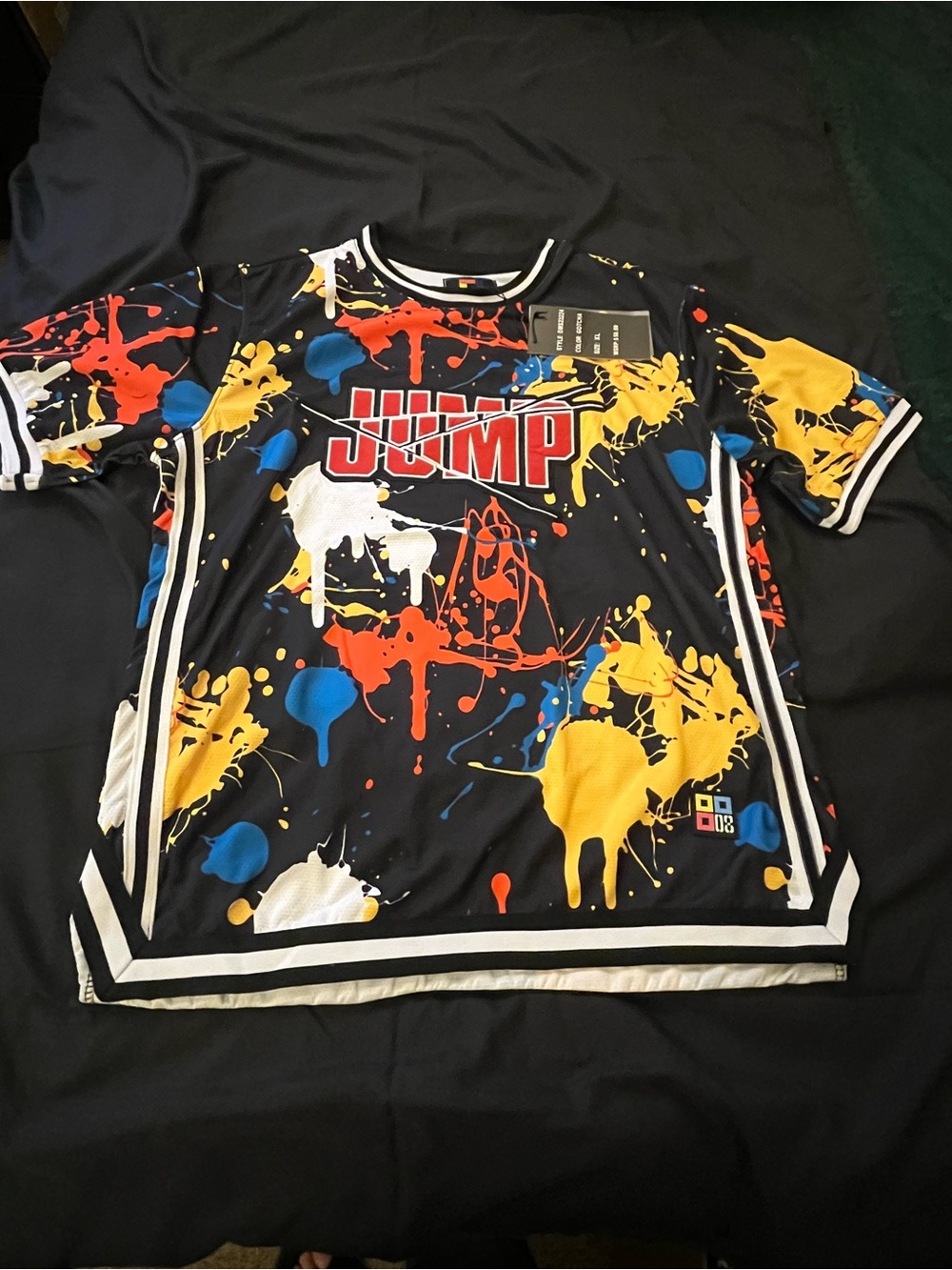 Jump Black Short Sleeve Tee with Red, Yellow, Blue & White Paint-Splash